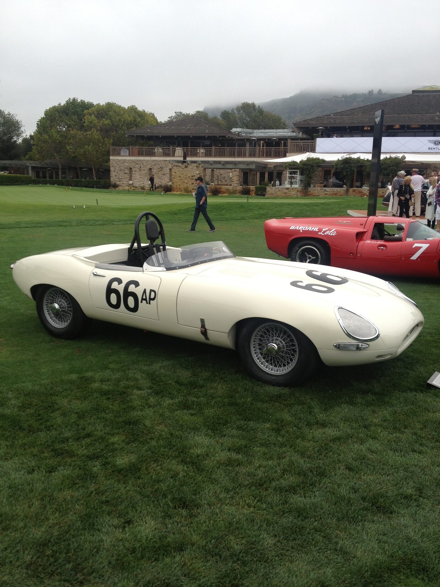 Vintage race car number 66 AP on the lawn at a car show
